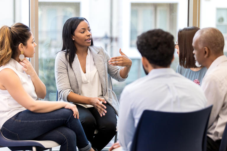 Group of l/earners participate in conversations