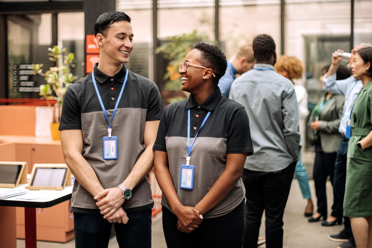 Two students networking at conference event