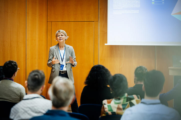 Lady leads a conference session